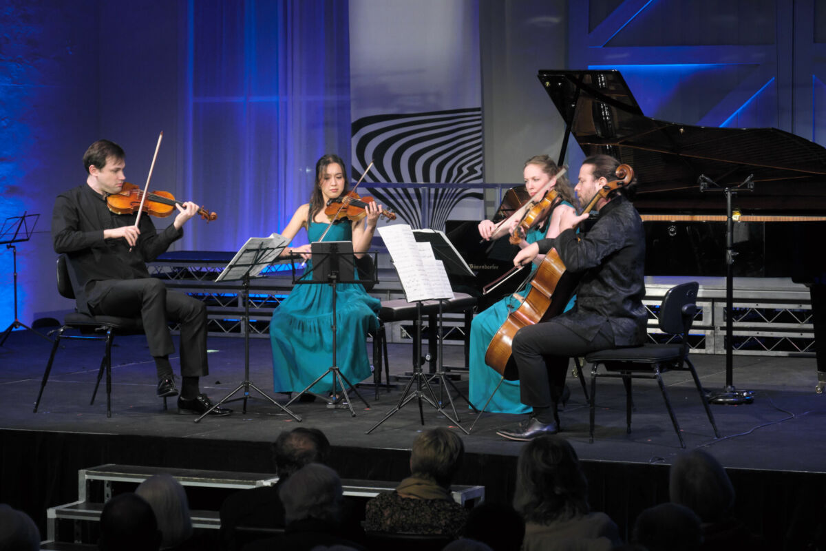 The Alma Moodie Quartet (violinists Kristian Winther and Anna da Silva Chen, violist Alexina Hawkins and cellist Thomas Marlin) perform at the 2022 Canberra International Music Festival. Photo © Peter Hislop.